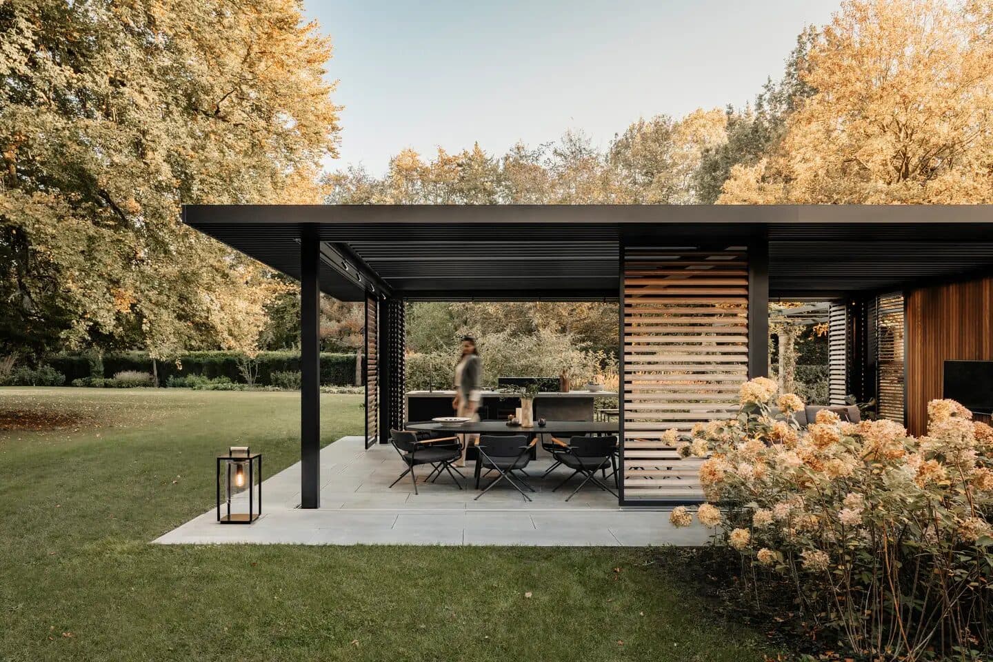 Aluminium pergola with louvred roof on a modern terrace